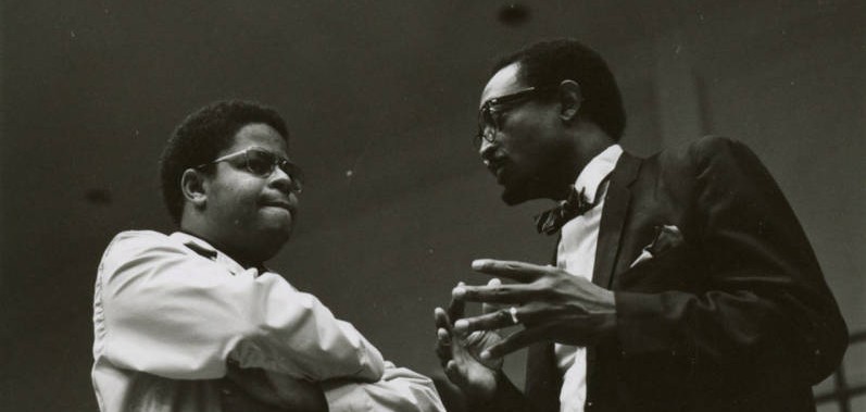 October 7, 1070: Talmadge Anderson, right, talks with Wendell Gray, Black Student Union advisor, at innagural workshop. 